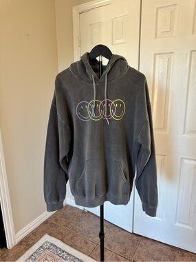 Black Pullover Hoodie with Neon Smiley Circle Graphic